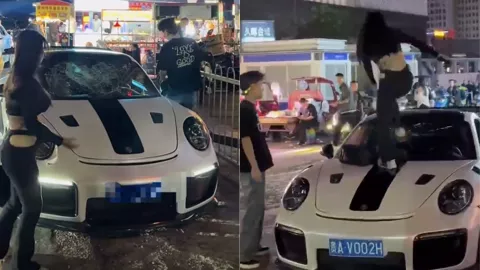 女子砸911事件